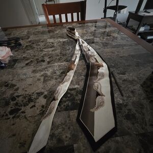 Elegant Paisley Necktie in Black and Cream